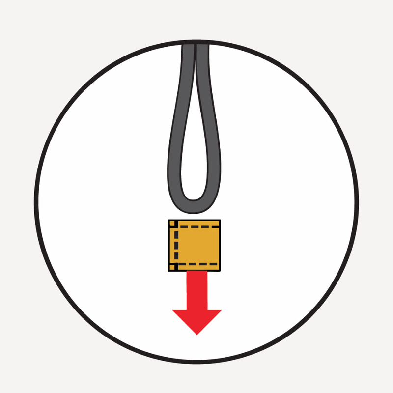 Slide off the side toggles from the elastic loops on both sides of the puplid.